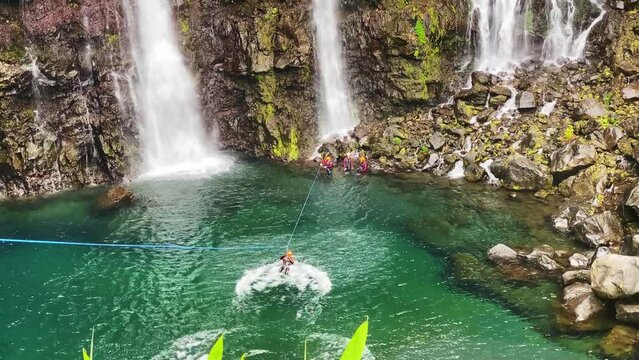 People go cayonning in Reunion island most beautiful waterfall