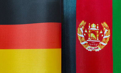 fragments of the national flags of Germany and Afghanistan in close-up