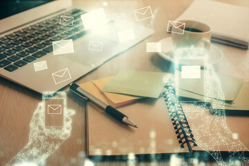 Double exposure of envelope drawing and desktop with coffee and items on table background. Concept...