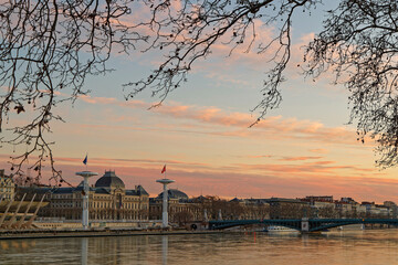 Fototapeta na wymiar LYON, FRANCE, February 19, 2022 : Sunset on the quays of Rhone river.