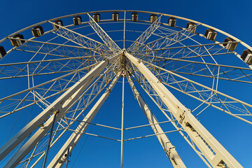 LYON, FRANCE, February 19, 2022 : The Ferris Wheel is back on Place Bellecour for the pleasure of young and old.