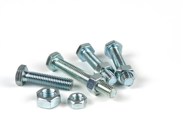 close up bolts and nuts isolated on white