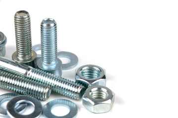 metal bolts and nuts with round washers close-up on a white background. copy space