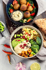 Vegan dishes assortment on light background.