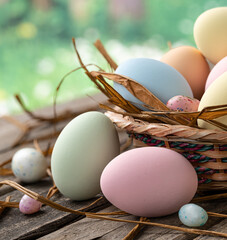 Colorful easter eggs with rural background - 488363347
