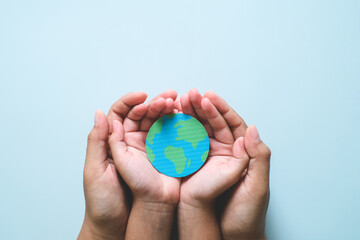 Hands holding earth, save planet, earth day concepts