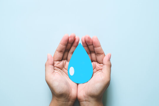 Hands holding clean water drop, world water day concepts