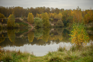 Fototapeta na wymiar Autumn lake in Moscow Region, Russia