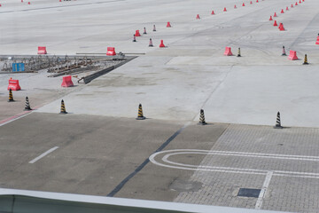 Traffic cone on the airport runway 
