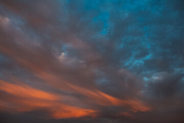 Fototapeta na wymiar Colourful landscape of cloudy sky at sunset.