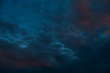 Dark cloudy sky evening, blue of colour. Natural landscape.