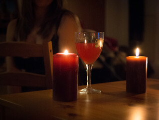 Candles wine and girl