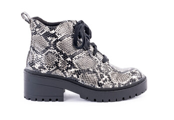 Pair of Lug Sole Boots With Snake Skin Pattern and Shoe Lace Isolated on White