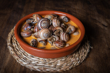 Snail stew, dish based on a sauce of vegetables and cooked snails.