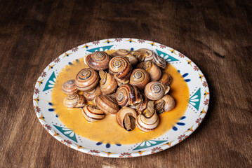 Snail stew, dish based on a sauce of vegetables and cooked snails.
