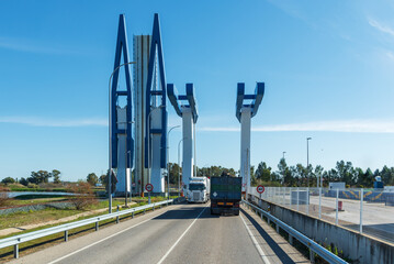 Trucks circulating on the lock bridge in Seville.