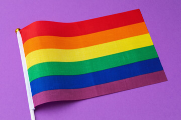 Rainbow flag on a colored background, background for the LGBT community