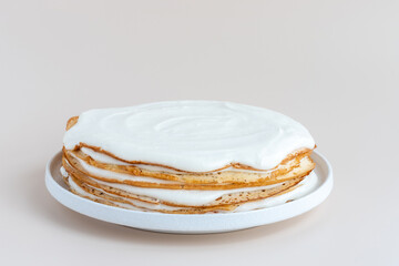 Whole vanilla crepe cake on a plate, gluten free, not decorated, mockup