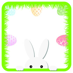 Easter frame with rabbit eggs and grass.