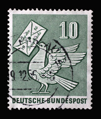 Stamp printed in Germany, shows Pigeon Holding Letter, Day of the Stamp, circa 1956