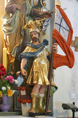 St. Florian, statue on the altar Our Lady of Sorrows in the parish church of St. Peter in Saint Peter Mreznicki, Croatia - obrazy, fototapety, plakaty