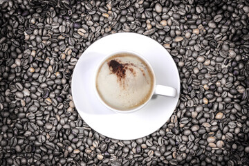 cup of coffee on old wooden table