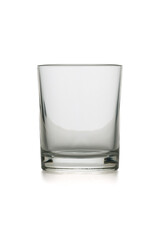 Wide and low glass tumbler without a handle isolated on a white background.