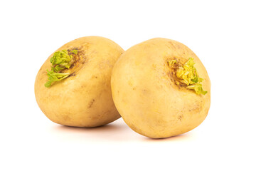 Two ripe yellow turnips on a white background.