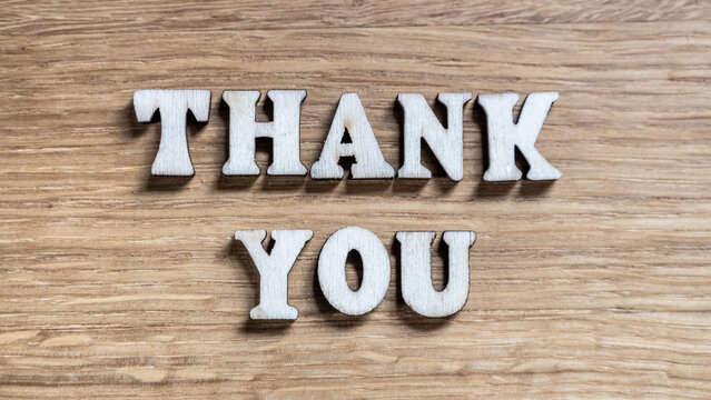Thank You - inscription of 3D wooden letters - Powered by Adobe