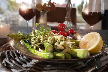 Roasted green asparagus arranged on a plate
Freshly roasted green asparagus arranged on a plate....