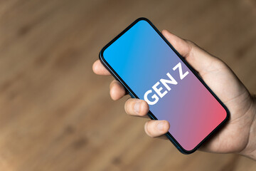 Gen Z - hand holding a phone