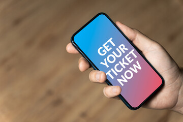 Get your ticket now - hand holding a phone