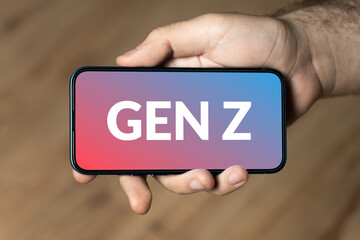 Gen Z - hand holding a phone