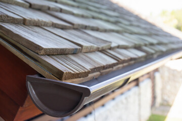 Rain gutter system for the roof of the house.