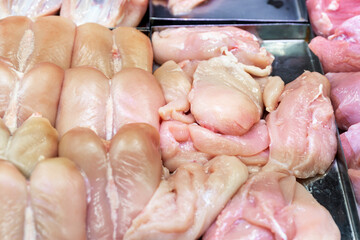 Raw chicken breast fillet in the refrigerator in the store. Healthy and diet food.