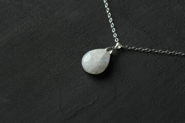 Moonstone, adularia natural pendant, necklace drop shape. Short necklace of Moonstone. Handmade jewelry made from natural stones. Modern Author's jewelry. Natural Moonstone pendant on silver chain