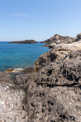 Fototapeta na wymiar rocky coast in cap de creus a sunny summer day