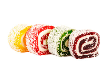 Heap of colorful Turkish delight isolated on white background. Turkish sweets isolated on white background. Ramadan.