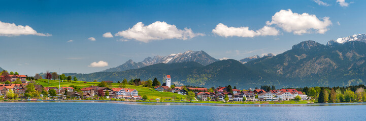 Naklejka premium panoramic scene with rural landscape and mountain range in Bavaria, germany
