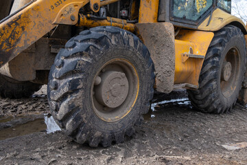 Fototapeta na wymiar Close photo of construction bulldozer whell