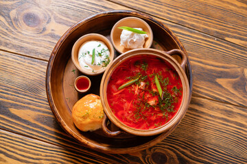 Borscht with garlic bread and lard. Menu design concept for a restaurant.