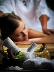 portrait of young beautiful woman in spa environment - 488394558