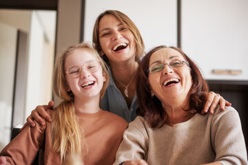 Portrait of three generations woman in family, cheerful happy grandmother mother and daughter...