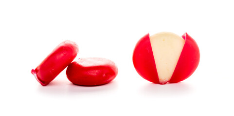 Piece of camembert cheese on white