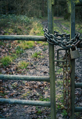 Secured gate with chain and padlock