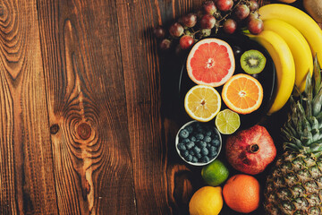 Obraz na płótnie Canvas Fruits on a wooden table