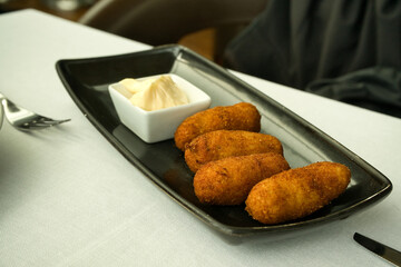 Delicious croquettes, typical spanish cover.