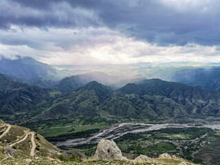 Fototapeta na wymiar Beautiful breathtaking view of the mountains during a thunderstorm in Dagestan, Caucasus Russia