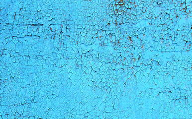 Abstract blue background with cracks and rust