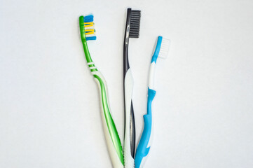 two toothbrushes for adults and children on isolated on white background.